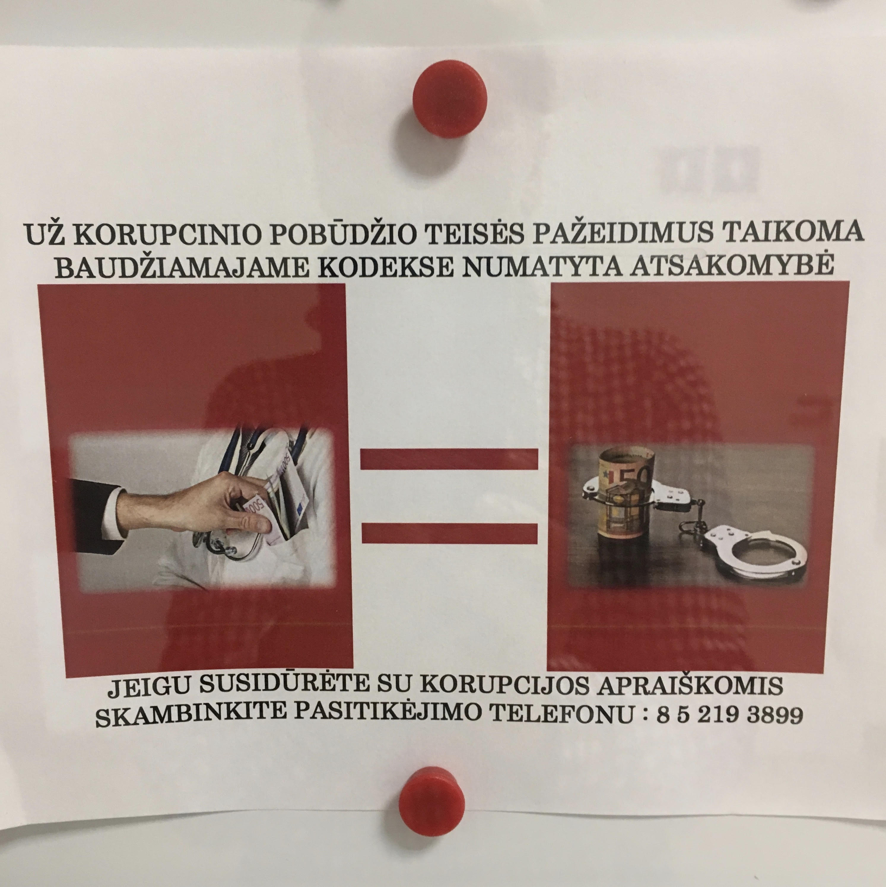 Photo was taken in Vilnius in 2017. "Corruption is a crime prosecuted by the Code of Criminal Procedure. If you encountered any signs of corruption, please call this trusted line. "