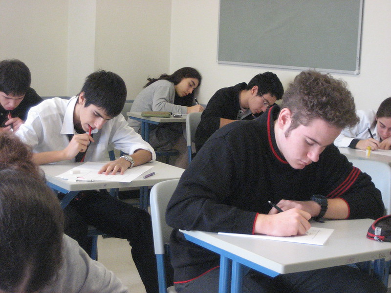 Photograph of people in a classroom.