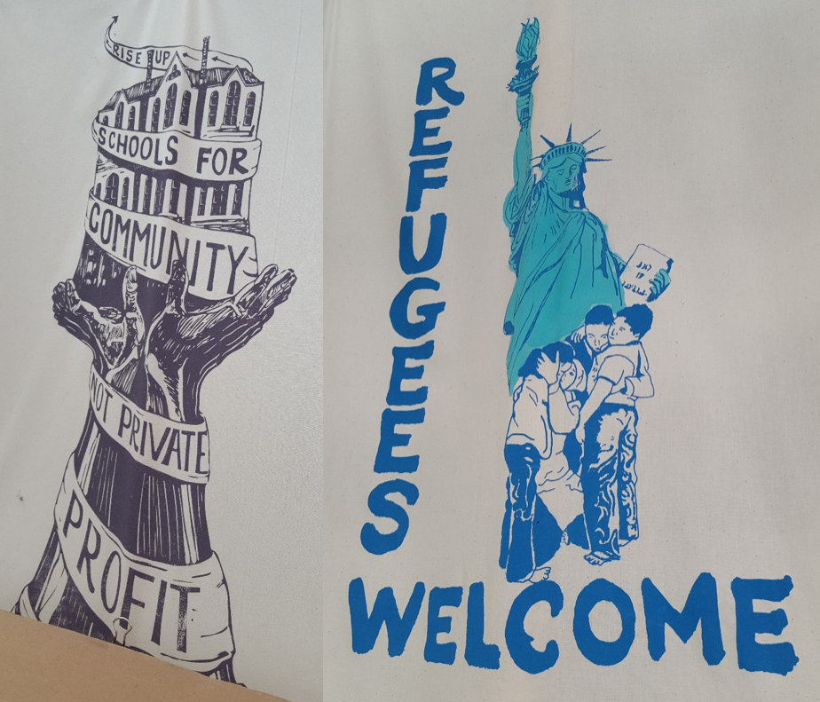 Two illustrated protest signs